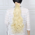 Postiche queue de cheval blond platine